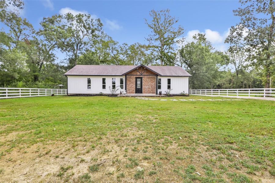 Front exterior of a new home in , Dayton, TX, highlighting curb appeal (Image 2). Front exterior of a new home in , Dayton, TX, highlighting curb appeal (Image 2).