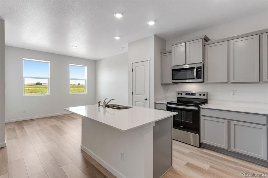 Furnished interior view inside a new home in Vista Meadows, Fort Lupton (Image 9).