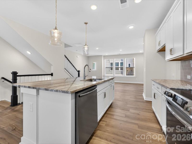 Furnished interior view inside a new home in Central Living at Craig, Charlotte (Image 6).