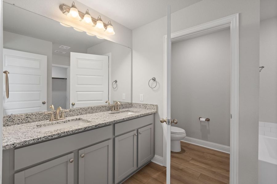 Furnished interior view inside a new home in Sunterra, Katy (Image 16).