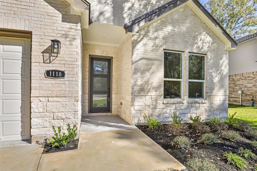 Exterior details and patio area of a home in , New Caney (Image 25).
