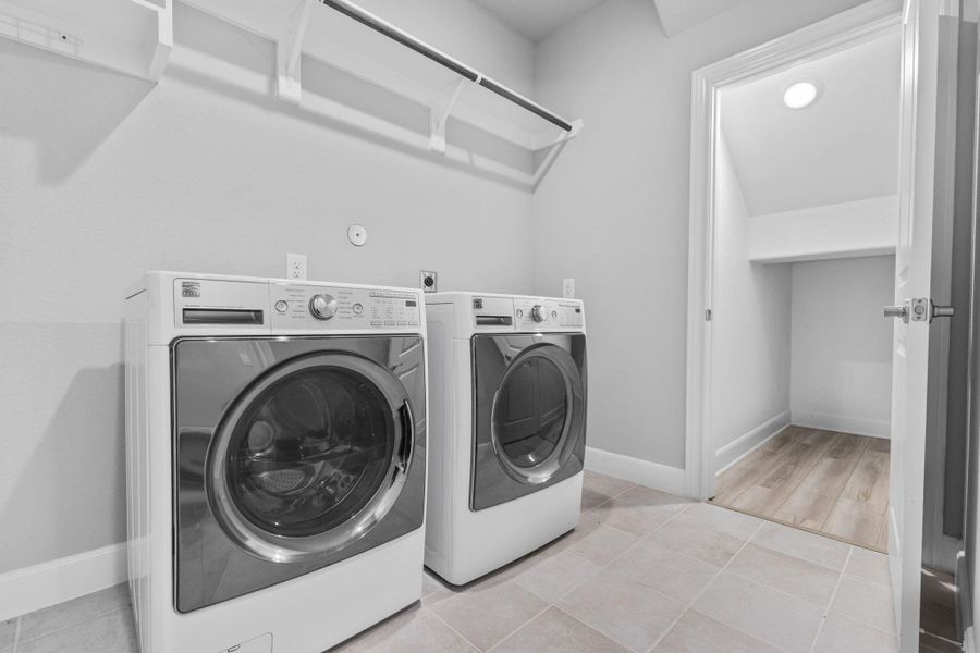 Laundry room and under stair storage. Laundry room and under stair storage.