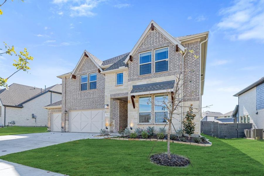 Front exterior of a new home in Union Park Classic 60, Little Elm, TX, highlighting curb appeal (Image 2). Front exterior of a new home in Union Park Classic 60, Little Elm, TX, highlighting curb appeal (Image 2).