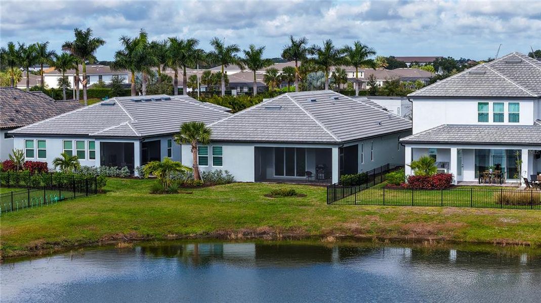Front exterior of a new home in , Bradenton, FL, highlighting curb appeal (Image 25).