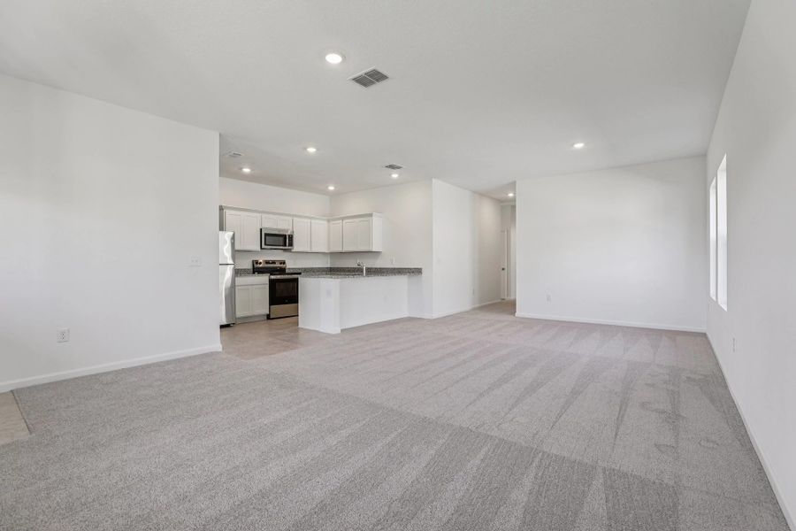 Representative unfurnished interior of a home built from the Halo by Starlight Homes in Hawks Run, Kissimmee (Image 14).