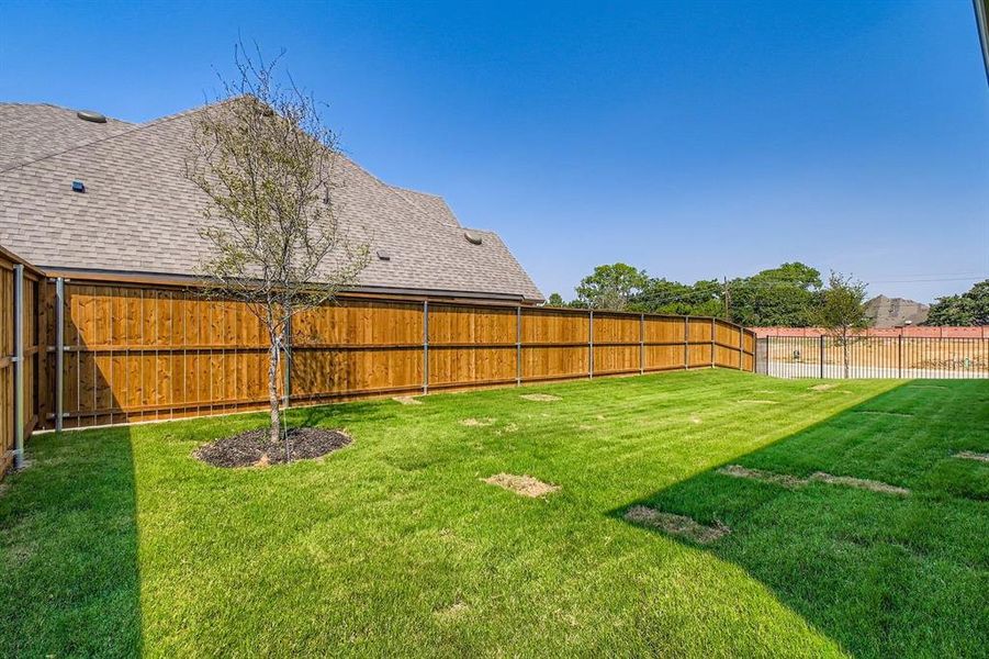 View of fenced backyard View of fenced backyard