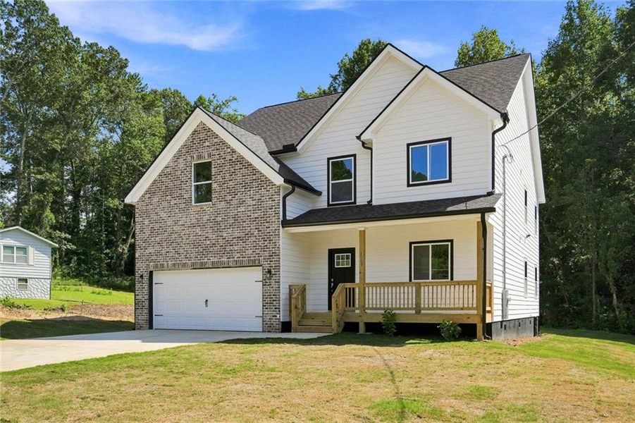 Front exterior of a new home in , Austell, GA, highlighting curb appeal (Image 20). Front exterior of a new home in , Austell, GA, highlighting curb appeal (Image 20).