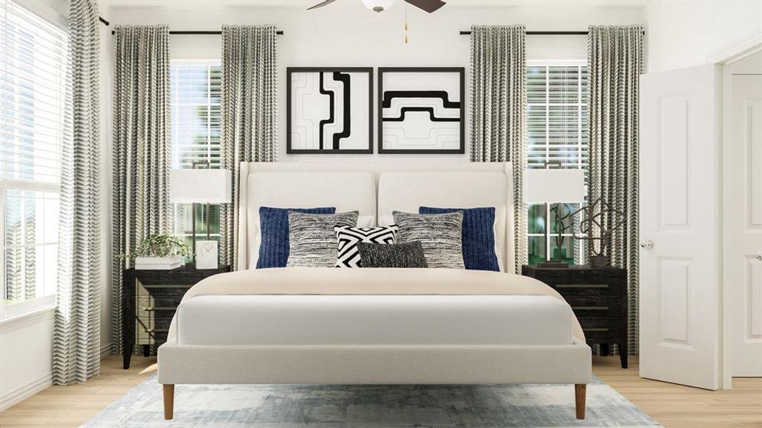 Bedroom featuring multiple windows, light wood-type flooring, and ceiling fan