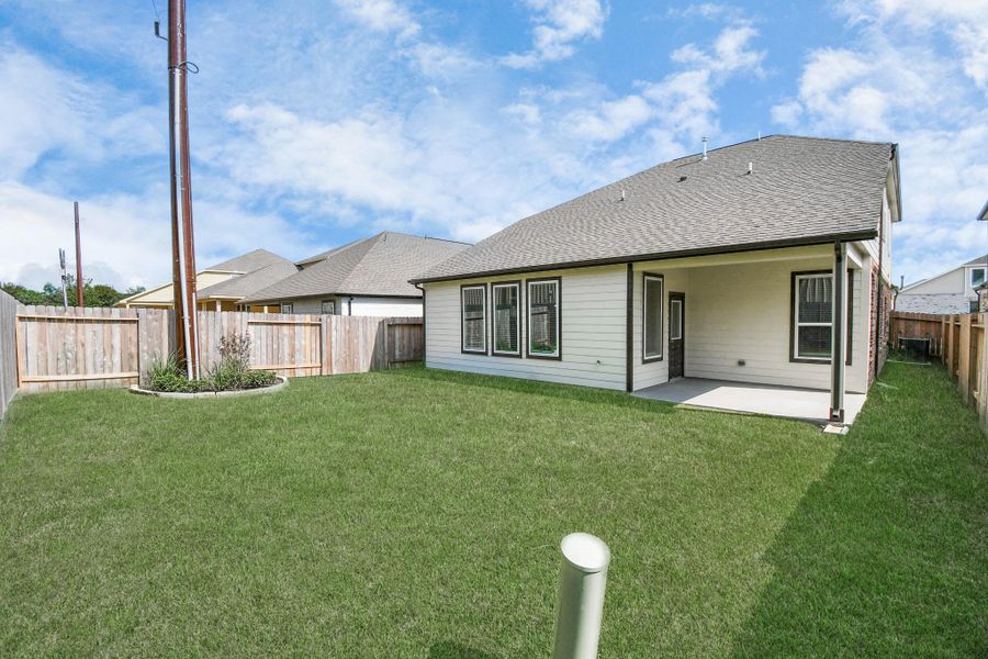 Experience outdoor living at its finest on this expansive covered patio, thoughtfully designed for BBQs and delightful outdoor dining. Experience outdoor living at its finest on this expansive covered patio, thoughtfully designed for BBQs and delightful outdoor dining.