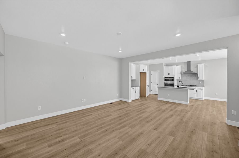 Spacious, unfurnished interior of a new home in Trailstone, Arvada (Image 11).