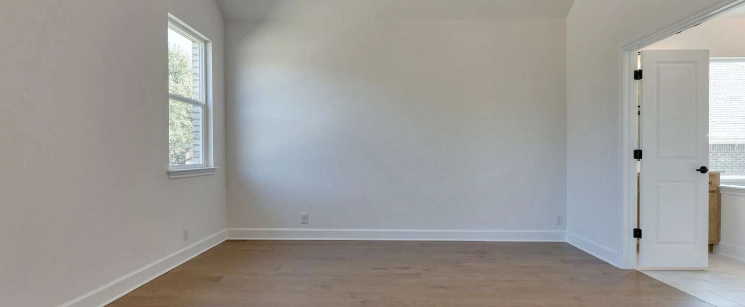 Representative unfurnished interior of a home built from the Alexander II by Ashton Woods in Sunday Creek at Kinder Ranch, San Antonio (Image 23).
