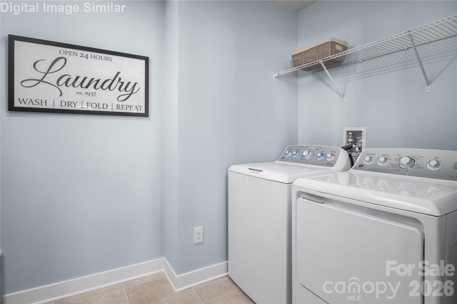 Main-level laundry - convenient to the primary bedroom.  Washer and Dryer optional.