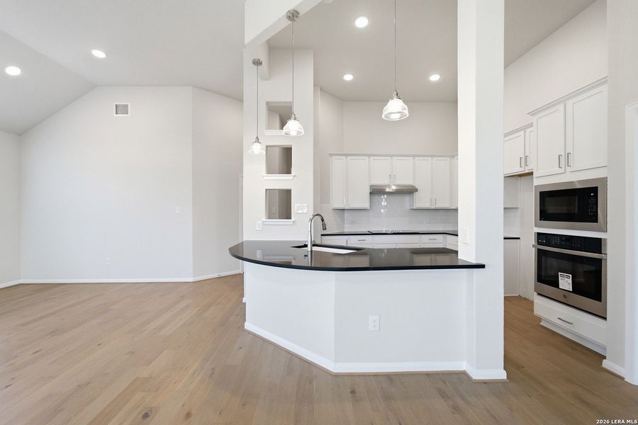 Furnished interior view inside a new home in The Woodlands at Medina Hills, Mico (Image 6).