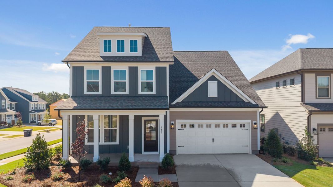 Front exterior of a new home in Lakeside Glen, York, SC, highlighting curb appeal (Image 1). Front exterior of a new home in Lakeside Glen, York, SC, highlighting curb appeal (Image 1).