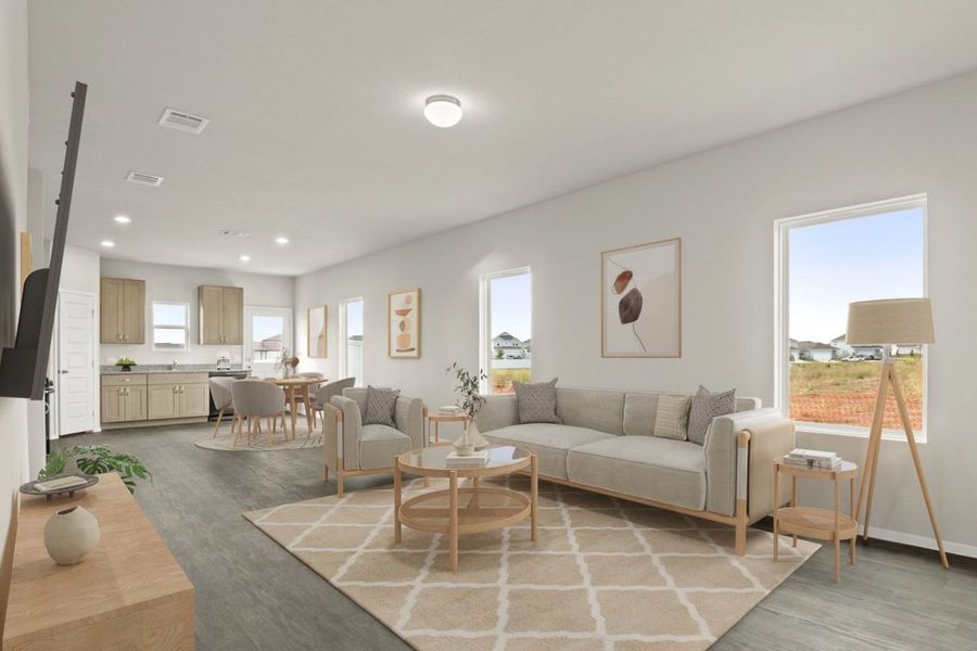 Image of a overview of a living/dining/kitchen area with scandinavian style furniture