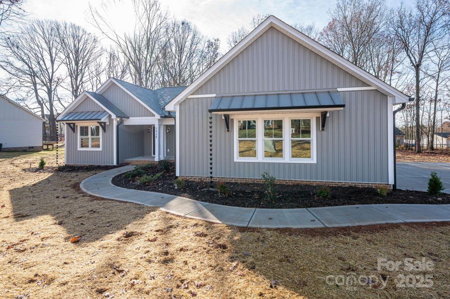 Front exterior of a new home in , Newton, NC, highlighting curb appeal (Image 2).