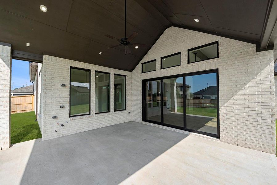 Exterior details and patio area of a home in Meridiana 80', Manvel (Image 16). Exterior details and patio area of a home in Meridiana 80', Manvel (Image 16).