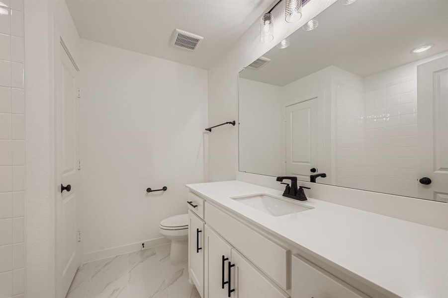 Furnished interior view inside a new home in Sweetgrass 50s, Haslet (Image 11).