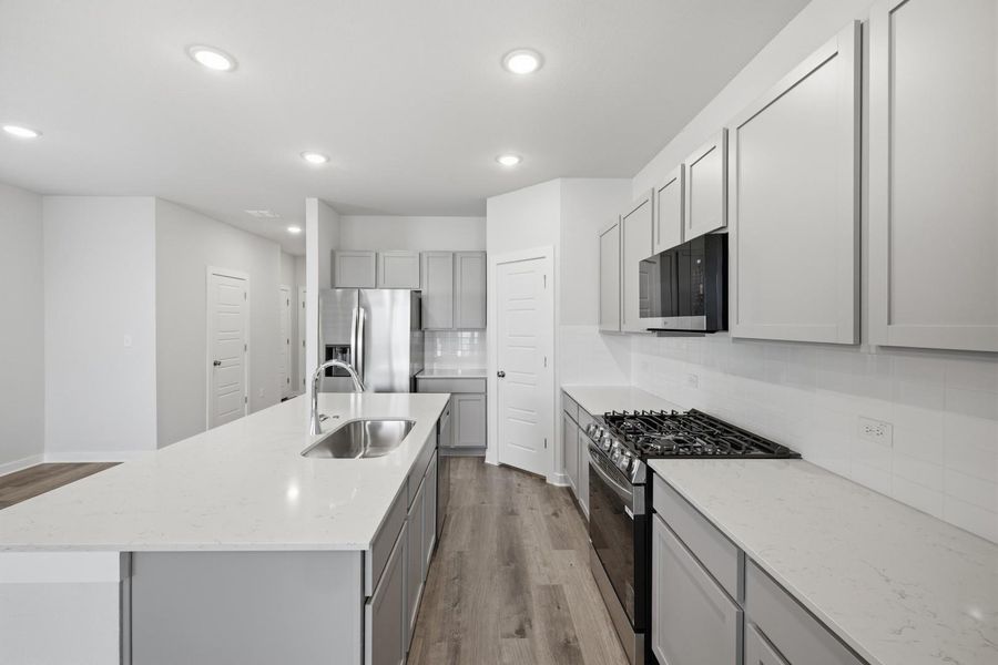 Furnished interior view inside a new home in Stallion Run, Buda (Image 33).