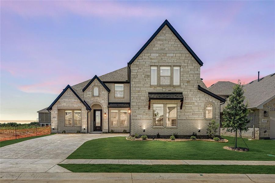 Front exterior of a new home in Chaparral Park, Oak Point, TX, highlighting curb appeal (Image 2). Front exterior of a new home in Chaparral Park, Oak Point, TX, highlighting curb appeal (Image 2).