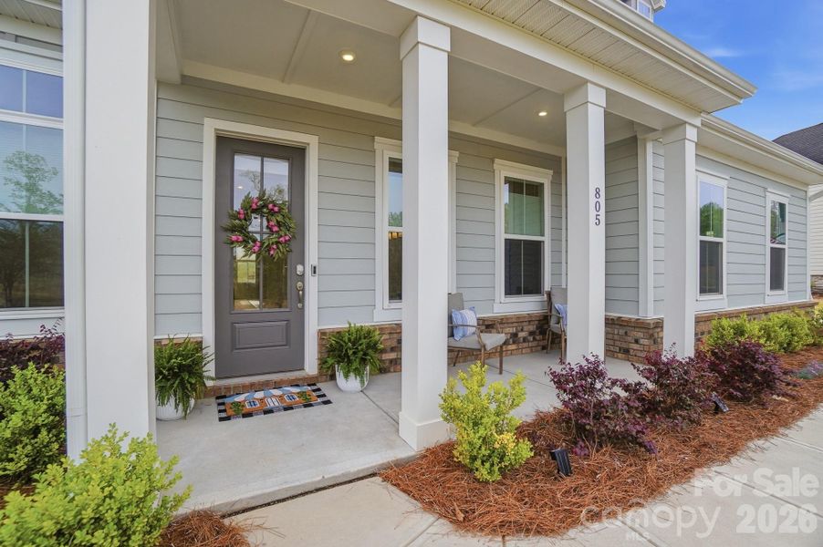 Exterior details and patio area of a home in , Belmont (Image 24).
