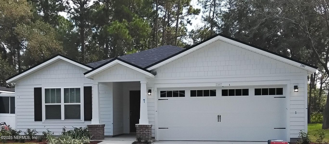 Front exterior of a new home in , Jacksonville, FL, highlighting curb appeal (Image 1). Front exterior of a new home in , Jacksonville, FL, highlighting curb appeal (Image 1).