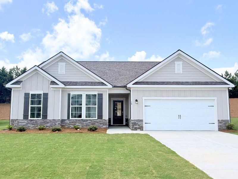 Front exterior of a new home in Sutton’s Landing, Statham, GA, highlighting curb appeal (Image 1). Front exterior of a new home in Sutton’s Landing, Statham, GA, highlighting curb appeal (Image 1).