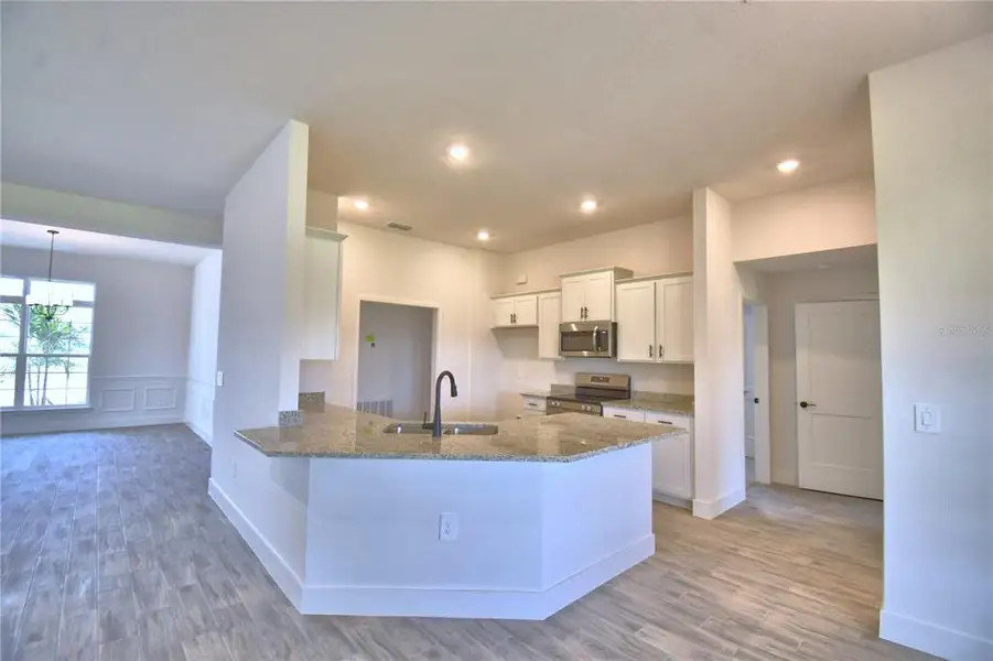 Furnished interior view inside a new home in Lake Juliana Estates, Auburndale (Image 9).