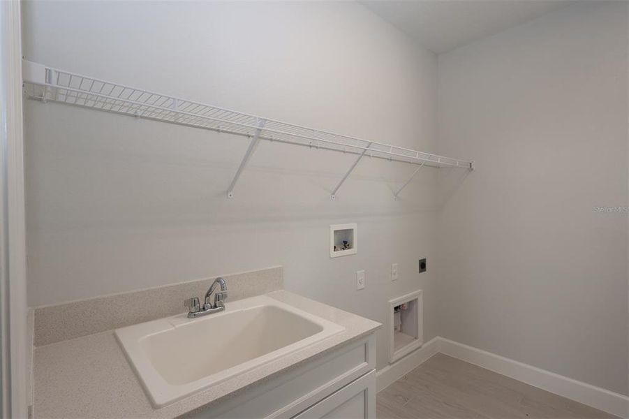 Furnished interior view inside a new home in Lake Star at Ovation, Winter Garden (Image 11).