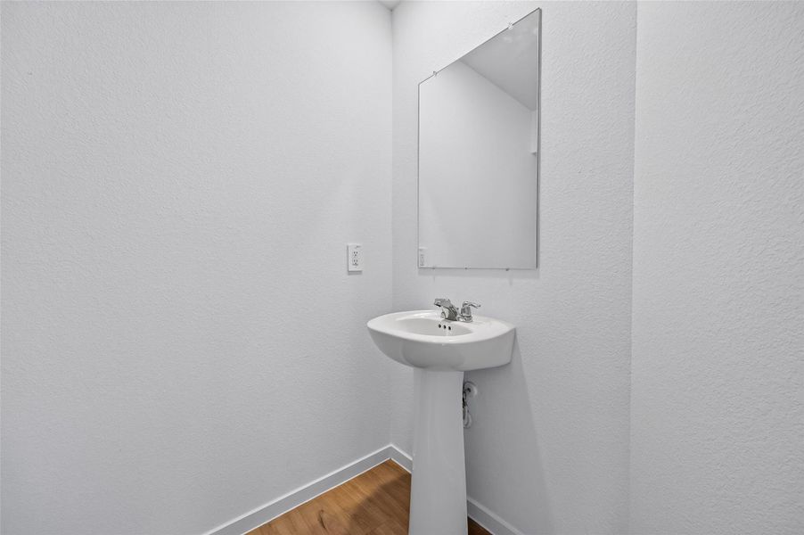 Half bathroom on the first floor. Half bathroom on the first floor.