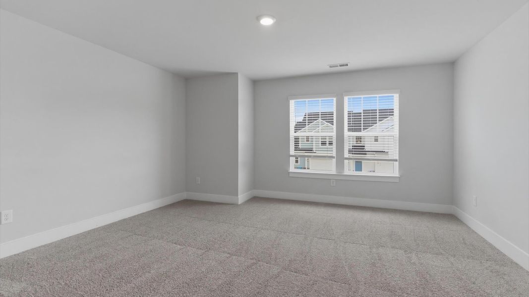 Furnished interior view inside a new home in Village at Midway, Anderson (Image 22).