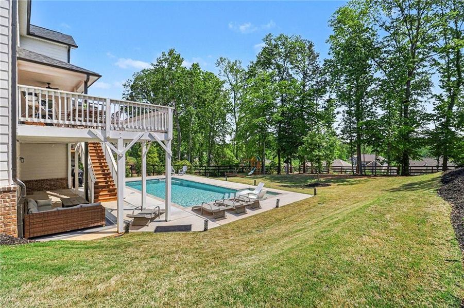 Exterior details and patio area of a home in Carmichael Farms, Canton (Image 22).
