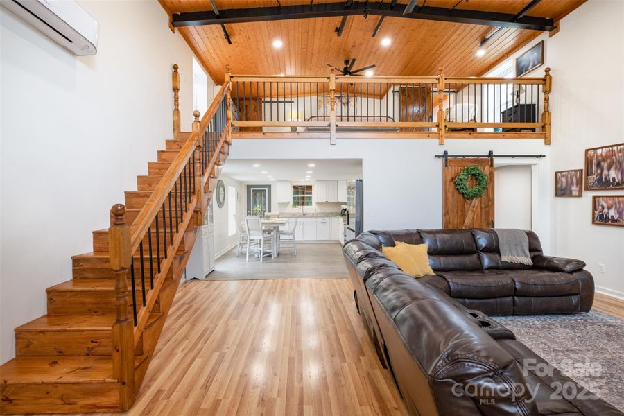 Loft area bedroom overlooking living space