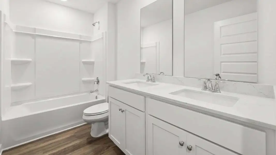 Furnished interior view inside a new home in Magnolia at the Bluffs Phase 3, Freeport (Image 7).