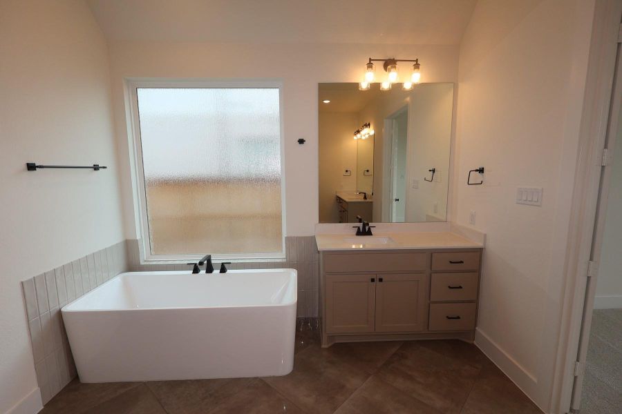 Furnished interior view inside a new home in Dunham Pointe, Cypress (Image 12).