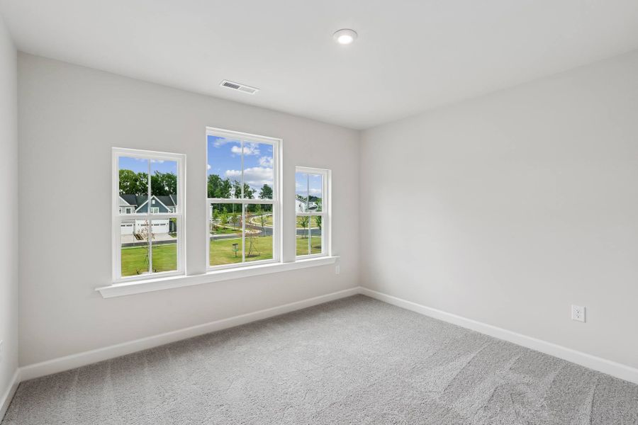 Representative unfurnished interior of a home built from the Eno by Tri Pointe Homes in Tredenham, Durham (Image 16).