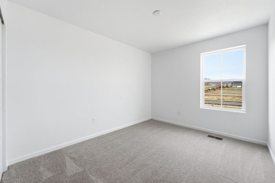 Spacious, unfurnished interior of a new home in Trailstone Townhomes - The Westerly Collection, Arvada (Image 17).