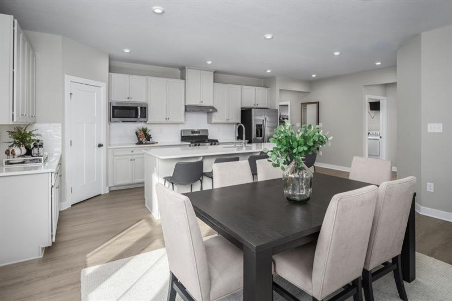 Representative furnished interior of a home built from the Palladio Ranch by Ryan Homes in Hope Pointe Single Family Homes, North Myrtle Beach (Image 2).