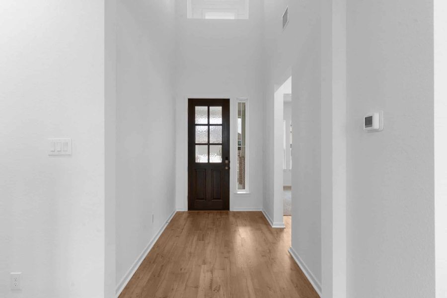 Spacious, unfurnished interior of a new home in Carillon, Manor (Image 12).