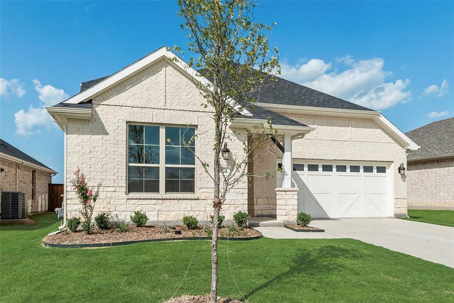Front exterior of a new home in Villages of Hurricane Creek, Anna, TX, highlighting curb appeal (Image 18). Front exterior of a new home in Villages of Hurricane Creek, Anna, TX, highlighting curb appeal (Image 18).