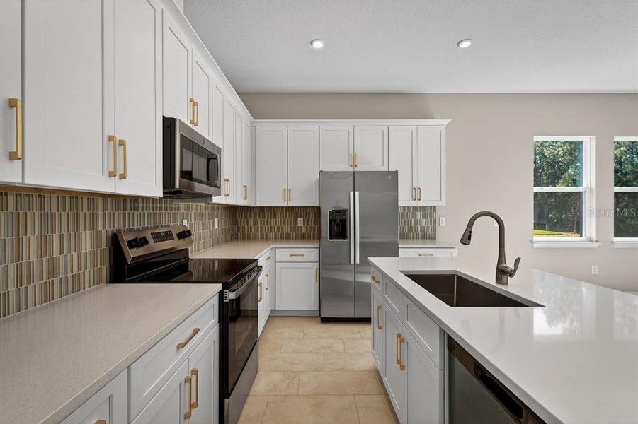 Furnished interior view inside a new home in Gray Hawk at Hole Two, Daytona Beach (Image 12).