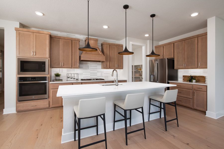 Representative furnished interior of a home built from the Laurel by Tri Pointe Homes in The Retreat at Harvest, Argyle (Image 14).