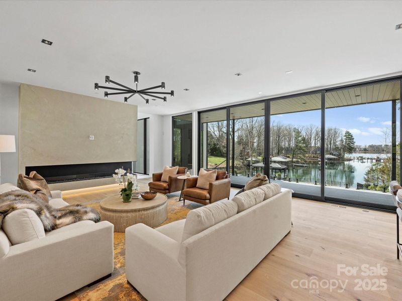 Great room featuring a venetian plastered fireplace