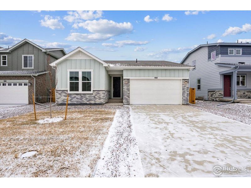 Front exterior of a new home in The Overlook at Johnstown Farms, Johnstown, CO, highlighting curb appeal (Image 19).