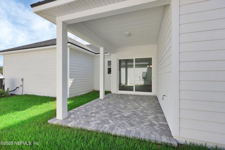 Front exterior of a new home in Seabrook Village at Seabrook, Nocatee, FL, highlighting curb appeal (Image 25). Front exterior of a new home in Seabrook Village at Seabrook, Nocatee, FL, highlighting curb appeal (Image 25).