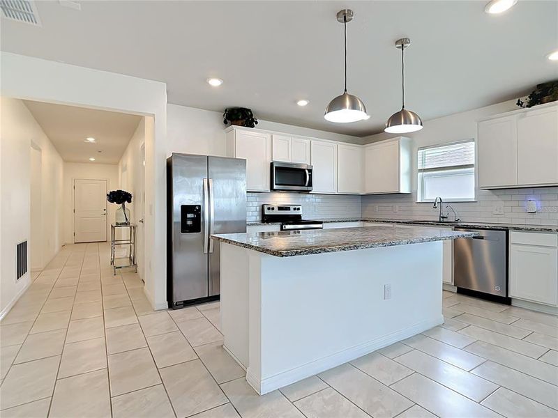 Furnished interior view inside a new home in , Winter Haven (Image 12).