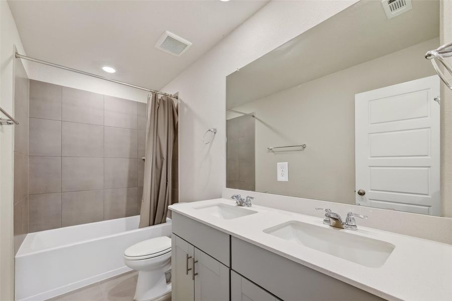 Furnished interior view inside a new home in Heights of Barbers Hill, Baytown (Image 13).