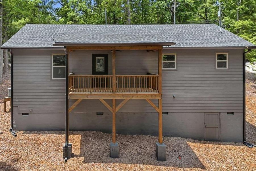 Exterior details and patio area of a home in , Ellijay (Image 25).