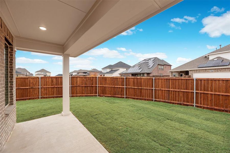 Exterior details and patio area of a home in Villages of Creekwood, Frisco (Image 3).