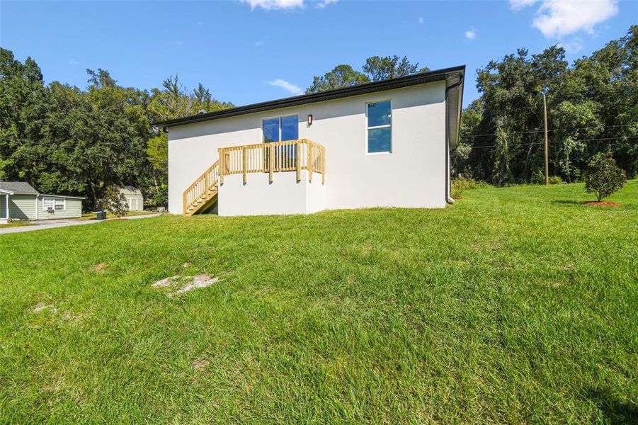 Exterior details and patio area of a home in , Brooksville (Image 36). Exterior details and patio area of a home in , Brooksville (Image 36).